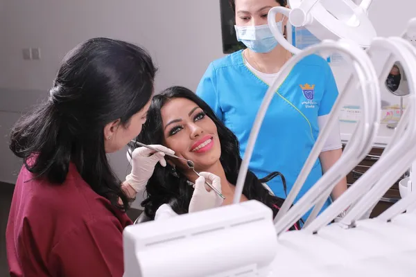 Happy dental patient after successful All-on-6 full arch implant treatment in Turkey, showing natural-looking results